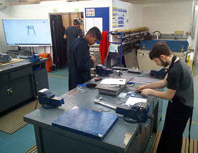 Uxbridge College's Mechanical Engineering students working in the workshop