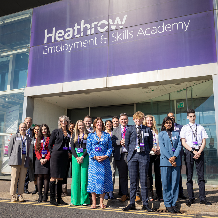 Students and staff from the Heathrow Employment and Skills Academy standing with HRUC staff outside the Academy